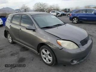 2008 Toyota Matrix STD with VIN 2T1KR30E28C706853, listed as a Copart auction lot 50926795 with 209,598 mi miles and Salvage Title. Bid and sale history available at DreamBid. Image 4.