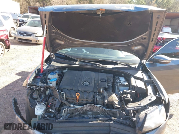 2012 Volkswagen Passat SE with VIN 1VWBH7A36CC027321, listed as a IAAI auction lot 41596709 with 173,357 mi miles and . Bid and sale history available at DreamBid. Image 10.