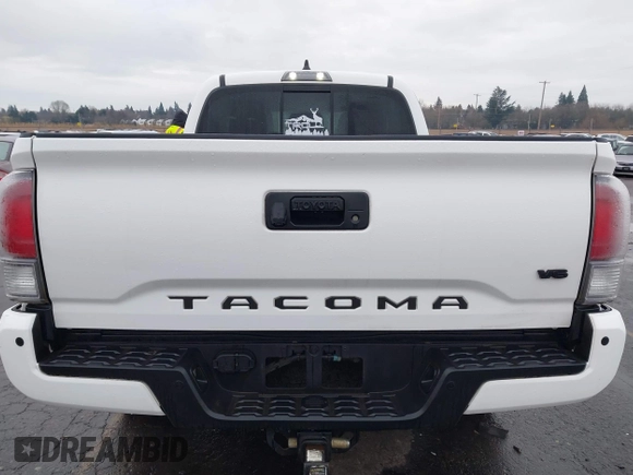 2021 Toyota Tacoma SR5 with VIN 3TMDZ5BN1MM100575, listed as a IAAI auction lot 41516274 with 61,974 mi miles and . Bid and sale history available at DreamBid. Image 17.