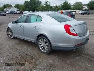 2013 Lincoln MKS with VIN 1LNHL9DK4DG606551, listed as a IAAI auction lot 42343140 with 70,424 mi miles and . Bid and sale history available at DreamBid. Image 3.