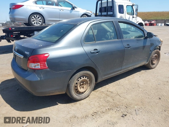 2009 Toyota Yaris with VIN JTDBT903891349784, listed as a IAAI auction lot 42135557 with 244,107 mi miles. Bid and sale history available at carsss.com. Image 4.