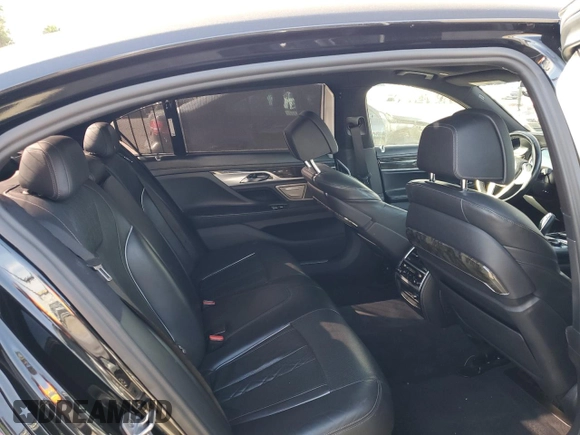 2018 BMW 7 Series 750i with VIN WBA7F0C54JGM23724, listed as a Copart auction lot 89399285 with 141,167 mi miles and Salvage Title. Bid and sale history available at carsss.com. Image 10.