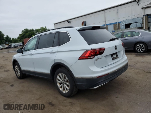 2018 Volkswagen Tiguan SEL with VIN 3VV2B7AX3JM185619, listed as a Copart auction lot 59421195 with 164,431 mi miles and Salvage title. Bid and sale history available at DreamBid. Image 2.