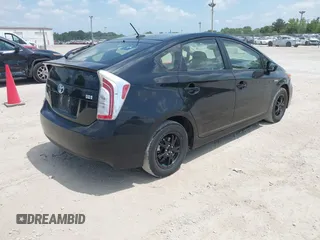 2014 Toyota Prius Four z VIN JTDKN3DU0E0384197, wystawiony jako IAAI lot #42519799 z przebiegiem 511 035 mil mil oraz . Historia ofert i sprzedaży dostępna na DreamBid. Obrazek 4.