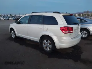 2013 Dodge Journey SE with VIN 3C4PDCAB2DT547459, listed as a IAAI auction lot 41254288 with 116,740 mi miles and . Bid and sale history available at DreamBid. Image 3.