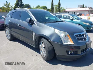 2012 Cadillac SRX Performance Collection z VIN 3GYFNBE31CS604304, wystawiony jako IAAI lot #42084828 z przebiegiem 88 398 mil mil oraz . Historia ofert i sprzedaży dostępna na DreamBid. Obrazek 1.