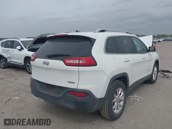 2018 Jeep Cherokee Latitude with VIN 1C4PJLCBXJD558927, listed as a IAAI auction lot 41942214 with 84,289 mi miles. Bid and sale history available at carsss.com. Image 4.