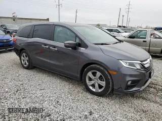 2018 Honda Odyssey EX-L with VIN 5FNRL6H78JB091153, listed as a Copart auction lot 52743715 with 69,849 mi miles and Salvage Title. Bid and sale history available at DreamBid. Image 4.