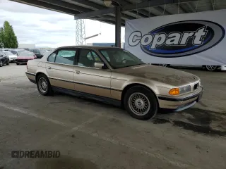 1998 BMW 7 Series 740il with VIN WBAGJ832XWDM11394, listed as a Copart auction lot 54390685 with 126,828 mi miles and Clean Title. Bid and sale history available at carsss.com. Image 4.