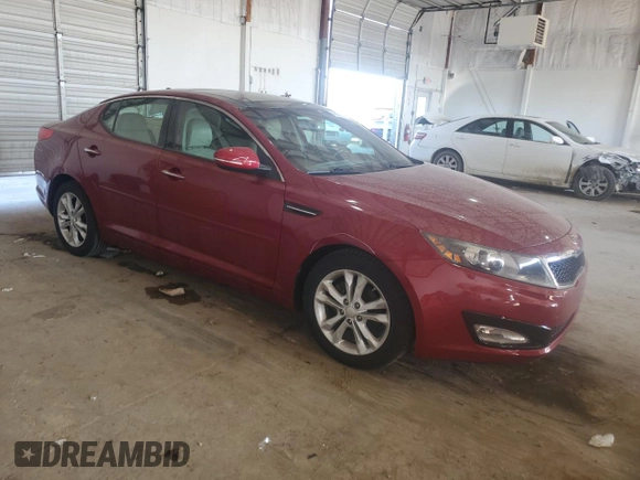 2012 Kia Optima EX with VIN 5XXGN4A77CG053039, listed as a Copart auction lot 48676705 with 114,501 mi miles and Salvage Title. Bid and sale history available at DreamBid. Image 4.