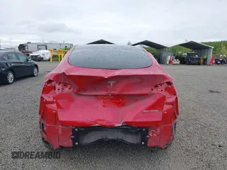 2023 Tesla Model Y Long Range with VIN 7SAYGDEE9PA145947, listed as a IAAI auction lot 42131783 with 4,956 mi miles and . Bid and sale history available at DreamBid. Image 17.