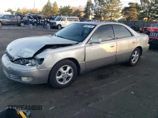 1998 Lexus ES 300 Luxury Sport Sdn with VIN JT8BF28GXW5035496, listed as a Copart auction lot 82807184 with 199,297 mi miles and Salvage Title. Bid and sale history available at carsss.com. Image 1.