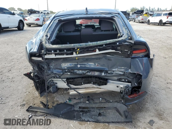 2024 Toyota Prius LE with VIN JTDACAAUXR3023011, listed as a Copart auction lot 61337595 with 25,660 mi miles and Non repairable. Bid and sale history available at DreamBid. Image 6.