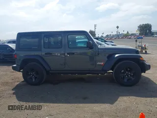 2020 Jeep Wrangler Unlimited Sport S z VIN 1C4HJXDN2LW261730, wystawiony jako IAAI lot #42034942 z przebiegiem 61 465 mil mil oraz . Historia ofert i sprzedaży dostępna na DreamBid. Obrazek 13.