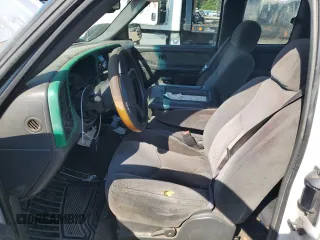 2003 Chevrolet Silverado 1500 with VIN 2GCEC19V031109634, listed as a Copart auction lot 70413734 with 392,365 mi miles and Salvage Title. Bid and sale history available at carsss.com. Image 7.
