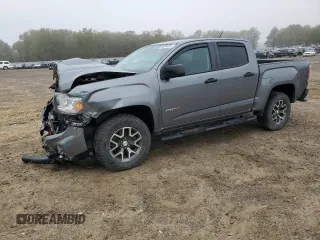 2021 GMC Canyon 4WD AT4 w/Cloth with VIN 1GTG6FEN8M1115918, listed as a Copart auction lot 80592964 with 59,888 mi miles and Salvage Title. Bid and sale history available at carsss.com. Image 1.