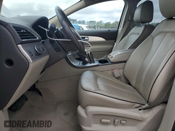 2013 Lincoln MKX with VIN 2LMDJ6JKXDBL12879, listed as a Copart auction lot 51145175 with 128,142 mi miles and Salvage Title. Bid and sale history available at carsss.com. Image 7.