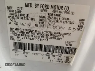 2011 Ford F-250 XL with VIN 1FT7X2A6XBEC39165, listed as a Copart auction lot 50987675 with 138,901 mi miles and Salvage title. Bid and sale history available at DreamBid. Image 12.