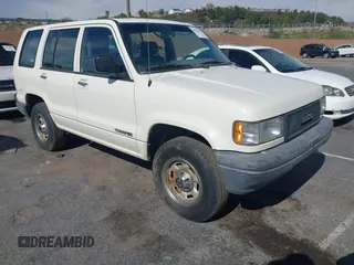 1994 Isuzu Trooper z VIN JACDH58V6R7910682, wystawiony jako IAAI lot #41919864 z przebiegiem 220 336 mil mil oraz . Historia ofert i sprzedaży dostępna na DreamBid. Obrazek 1.