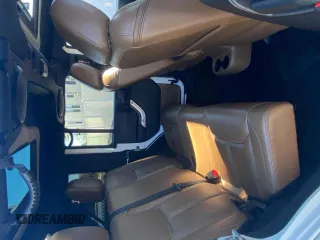 2014 Jeep Wrangler Unlimited Sahara with VIN 1C4BJWEG1EL272951, listed as a Copart auction lot 51147245 with 56,989 mi miles and Clean Title. Bid and sale history available at carsss.com. Image 6.