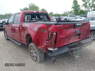 2018 Ford F-150 XL with VIN 1FTFW1E56JFE42735, listed as a IAAI auction lot 42382728 with 97,339 mi miles and . Bid and sale history available at DreamBid. Image 3.