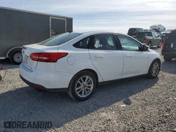 2017 Ford Focus SE z VIN 1FADP3F22HL312683, wystawiony jako Copart lot #53385315 z przebiegiem 88 751 mil mil oraz Szkoda całkowita • Salvage title. Historia ofert i sprzedaży dostępna na DreamBid. Obrazek 3.