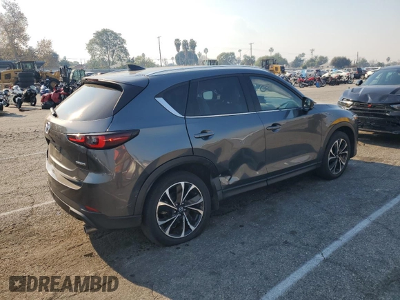 2023 Mazda CX-5 2.5 S Premium Plus Package with VIN JM3KFBEM6P0185977, listed as a Copart auction lot 87872585 with 28,568 mi miles and Salvage Title. Bid and sale history available at carsss.com. Image 3.