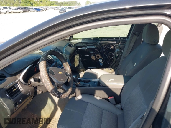 2014 Chevrolet Impala LS with VIN 2G11X5SLXE9174989, listed as a IAAI auction lot 42572065 with 309,311 mi miles and . Bid and sale history available at DreamBid. Image 5.