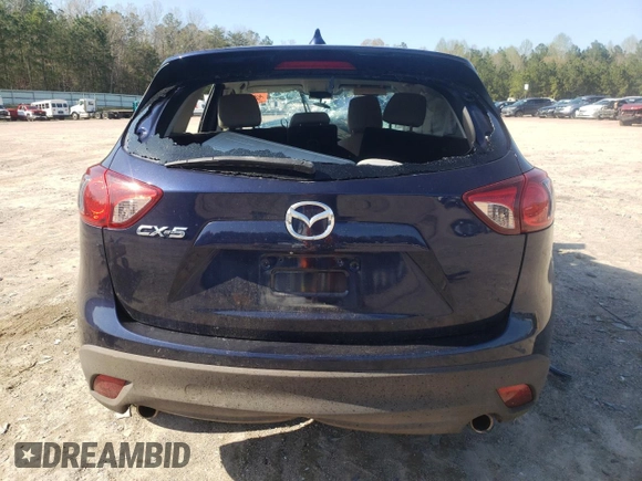 2013 Mazda CX-5 Touring with VIN JM3KE2CE0D0142102, listed as a Copart auction lot 51223575 with Not Provided miles and Salvage Title. Bid and sale history available at DreamBid. Image 6.