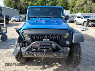 2015 Jeep Wrangler Unlimited Sport with VIN 1C4BJWDG1FL683558, listed as a Copart auction lot 59883545 with 107,267 mi miles and Salvage title. Bid and sale history available at DreamBid. Image 5.