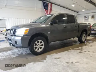 2004 Nissan Titan LE z VIN 1N6AA07B74N507976, wystawiony jako Copart lot #56402785 z przebiegiem 181 253 mil mil oraz Szkoda całkowita • Salvage title. Historia ofert i sprzedaży dostępna na DreamBid. Obrazek 1.