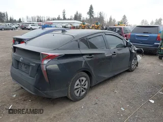 2017 Toyota Prius Two with VIN JTDKBRFU4H3041050, listed as a IAAI auction lot 41559037 with 150,143 mi miles and . Bid and sale history available at carsss.com. Image 4.