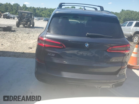 2019 BMW X5 xDrive40i with VIN 5UXCR6C53KLL14710, listed as a Copart auction lot 57408185 with 51,547 mi miles and Salvage title. Bid and sale history available at DreamBid. Image 6.