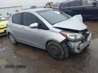2015 Toyota Yaris L with VIN VNKKTUD33FA035380, listed as a IAAI auction lot 41553905 with 157,745 mi miles. Bid and sale history available at carsss.com. Image 1.