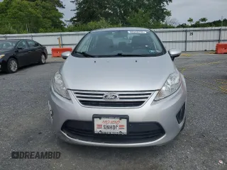 2013 Ford Fiesta SE z VIN 3FADP4BJ9DM108667, wystawiony jako Copart lot #58542295 z przebiegiem 94 812 mil mil oraz Szkoda całkowita • Salvage title. Historia ofert i sprzedaży dostępna na DreamBid. Obrazek 5.