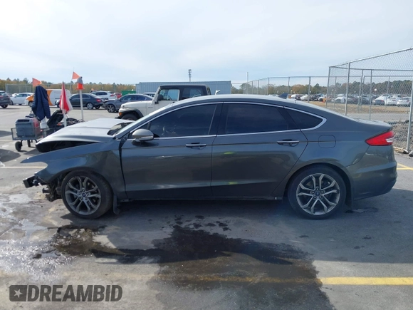 2019 Ford Fusion SEL with VIN 3FA6P0CD9KR252892, listed as a IAAI auction lot 41087776 with 109,498 mi miles and . Bid and sale history available at DreamBid. Image 13.