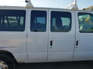 2011 Ford Econoline Passenger XL with VIN 1FBNE3BL0BDA75121, listed as a IAAI auction lot 41469640 with 105,558 mi miles. Bid and sale history available at carsss.com. Image 13.