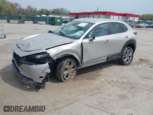 2022 Mazda CX-30 S Select z VIN 3MVDMBBL2NM439681, wystawiony jako IAAI lot #41960902 z przebiegiem 22 730 mil mil oraz . Historia ofert i sprzedaży dostępna na DreamBid. Obrazek 20.