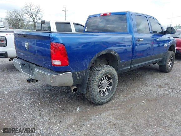 2014 Ram 2500 Tradesman with VIN 3C6UR5CL3EG302645, listed as a IAAI auction lot 41985091 with 144,384 mi miles. Bid and sale history available at carsss.com. Image 4.