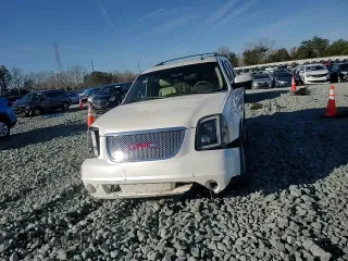 2012 GMC Yukon SLT with VIN 1GKS1CE03CR100582, listed as a Copart auction lot 44990745 with 146,089 mi miles and Salvage Title. Bid and sale history available at carsss.com. Image 11.