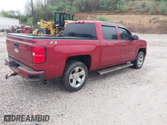 2018 Chevrolet Silverado 1500 LT with VIN 3GCUKREC2JG201754, listed as a IAAI auction lot 41944175 with 112,305 mi miles. Bid and sale history available at carsss.com. Image 4.
