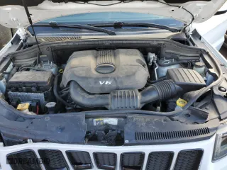 2015 Jeep Grand Cherokee Altitude with VIN 1C4RJFAG4FC954941, listed as a Copart auction lot 42010465 with 125,311 mi miles and Salvage Title. Bid and sale history available at carsss.com. Image 13.