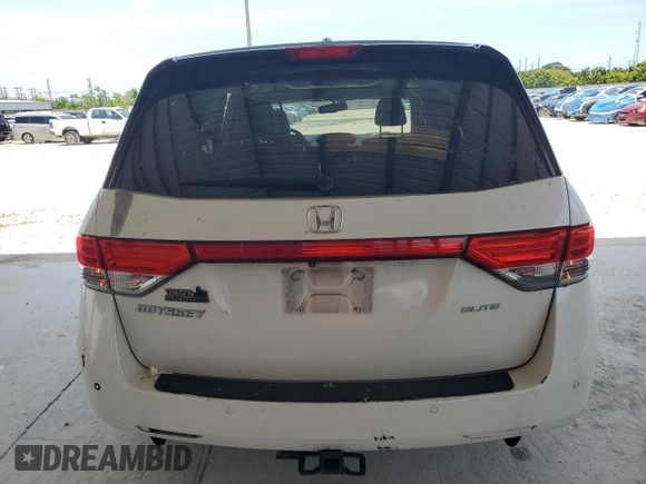 2014 Honda Odyssey Touring z VIN 5FNRL5H9XEB123330, wystawiony jako Copart lot #59023145 z przebiegiem 118 371 mil mil oraz Nie do naprawy • Non repairable. Historia ofert i sprzedaży dostępna na DreamBid. Obrazek 6.