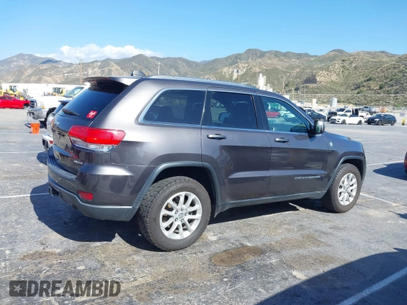 2016 Jeep Grand Cherokee Laredo z VIN 1C4RJFAG5GC390413, wystawiony jako IAAI lot #42254165 z przebiegiem 99 231 mil mil oraz . Historia ofert i sprzedaży dostępna na DreamBid. Obrazek 13.