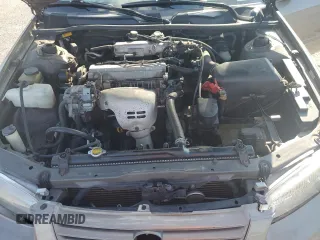 1999 Toyota Camry LE z VIN JT2BG22K0X0295893, wystawiony jako Copart lot #56183655 z przebiegiem 327 172 mil mil oraz Szkoda całkowita • Salvage title. Historia ofert i sprzedaży dostępna na DreamBid. Obrazek 11.