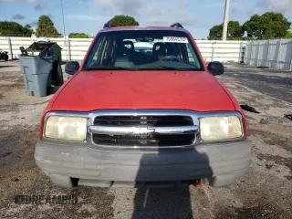 2003 Chevrolet Tracker z VIN 2CNBE13CX36943395, wystawiony jako Copart lot #70964574 z przebiegiem 118 975 mil mil oraz Szkody całkowita. Historia ofert i sprzedaży dostępna na DreamBid. Obrazek 5.