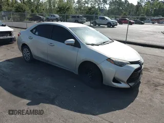 2018 Toyota Corolla L with VIN 5YFBURHEXJP810003, listed as a IAAI auction lot 42526648 with 84,546 mi miles and . Bid and sale history available at DreamBid. Image 1.