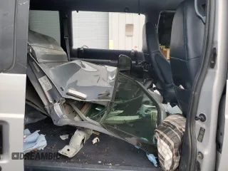 2000 Chevrolet Astro with VIN 1GNEL19W9YB176191, listed as a Copart auction lot 80102404 with Not Provided miles and Salvage Title. Bid and sale history available at carsss.com. Image 11.