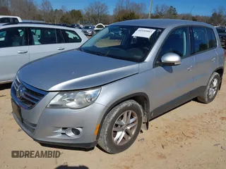 2011 Volkswagen Tiguan SE with VIN WVGBV7AX5BW549090, listed as a IAAI auction lot 41550983 with 153,739 mi miles and . Bid and sale history available at DreamBid. Image 2.