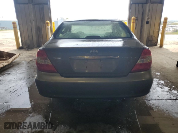 2003 Toyota Camry LE with VIN 4T1BE32K53U772495, listed as a Copart auction lot 54733305 with 115,227 mi miles and Salvage Title. Bid and sale history available at DreamBid. Image 6.